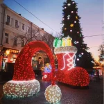 giant christmas boot and santa hat light decoration outdoor holiday motif lighting installed in city square christmas project