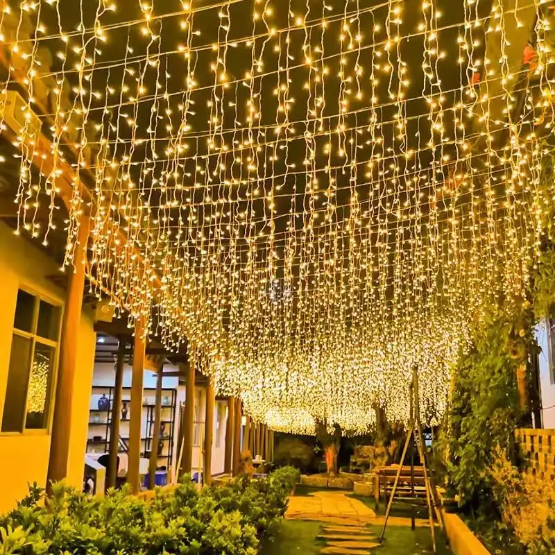 commercial outdoor curtain string lights installation for luxury landscape lighting project