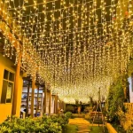 Outdoor patio decorated with warm white wedding LED string lights creating elegant decorative lighting for gardens and event venues