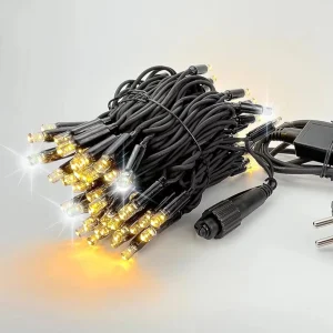 Heavy duty string lights with warm white LEDs, black rubber cable, connector, and plug for outdoor commercial decoration