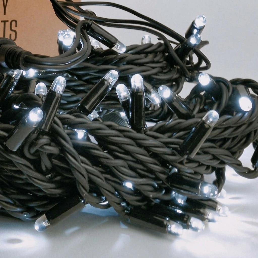 Cool White LED Curtain Light Rubber Wire Close-Up Close-up of cool white LED curtain light strands with black rubber wire