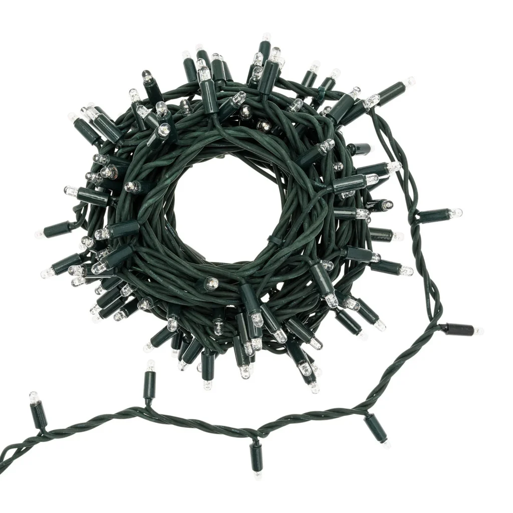 IP67 green PVC string lights coiled on a white background