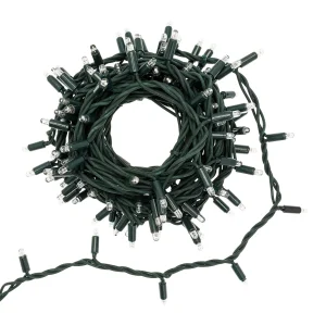 IP67 green PVC string lights coiled on a white background