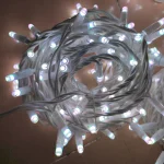 soft white RGB pixel string light effect on white cable