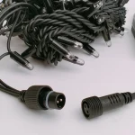 threaded male and female connectors on rubber cable string lights